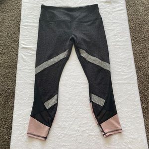 RBX dark grey leggings with pink design on bottom.